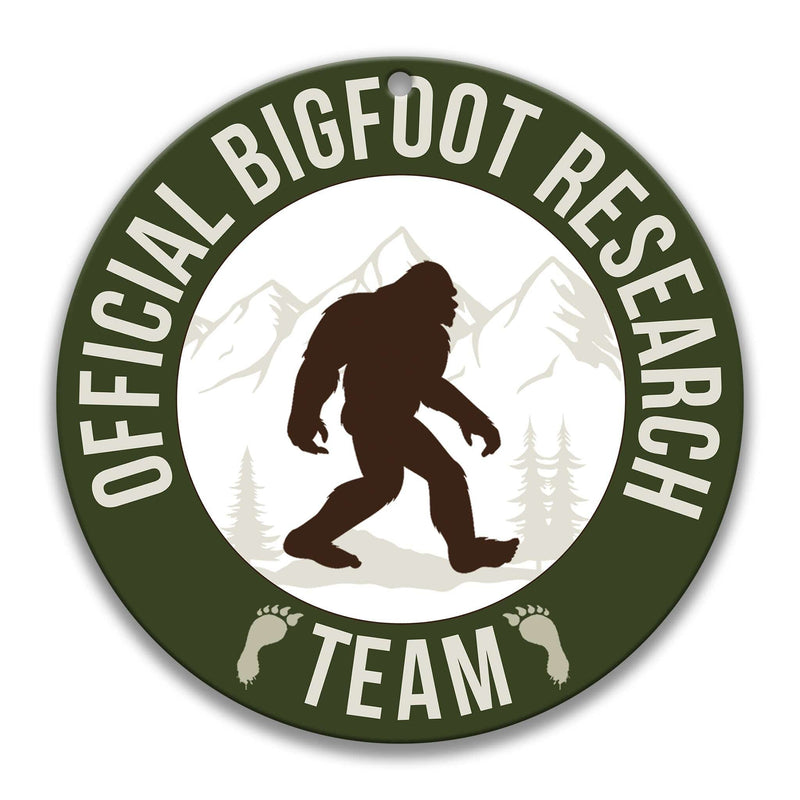 Official Bigfoot Research Team in Green Sasquatch Round Metal Sign - Designs by Linda Nee