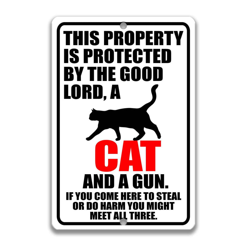 Cat Property Protected by the Good Lord, a Cat, and a Gun Cat Sign - Designs by Linda Nee