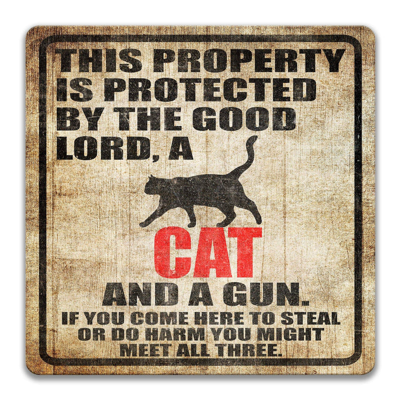 Cat Property Protected by the Good Lord, a Cat, and a Gun Cat Sign - Designs by Linda Nee