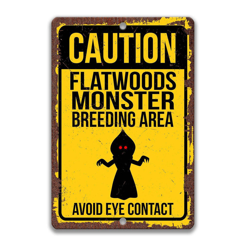 Caution Flatwoods Monster Breeding Area Avoid Eye Contact Sign - Designs by Linda Nee