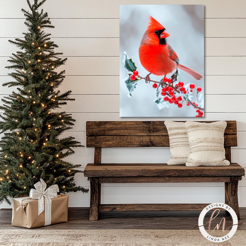 a red cardinal sits on a branch next to a christmas tree