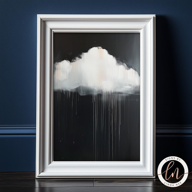 a picture frame with a painting of a cloud