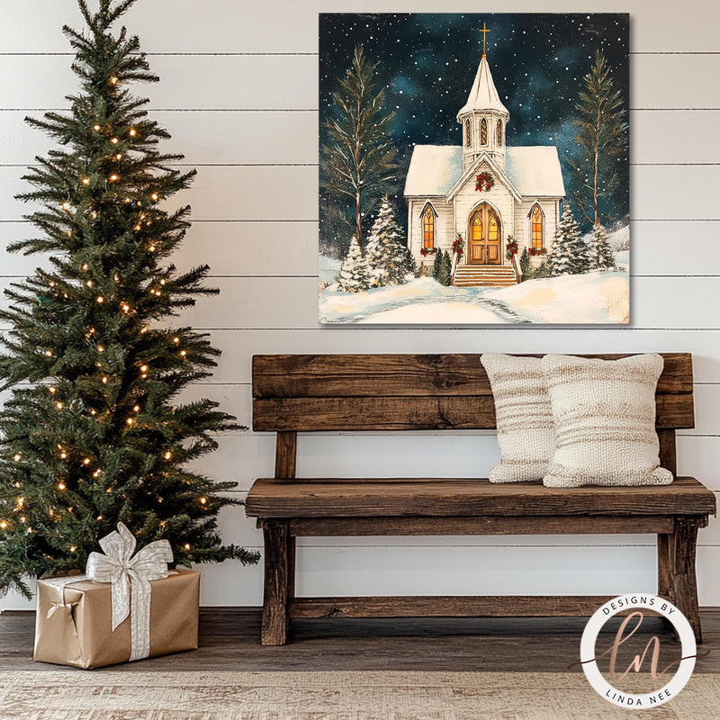 a painting of a church on a wall next to a christmas tree