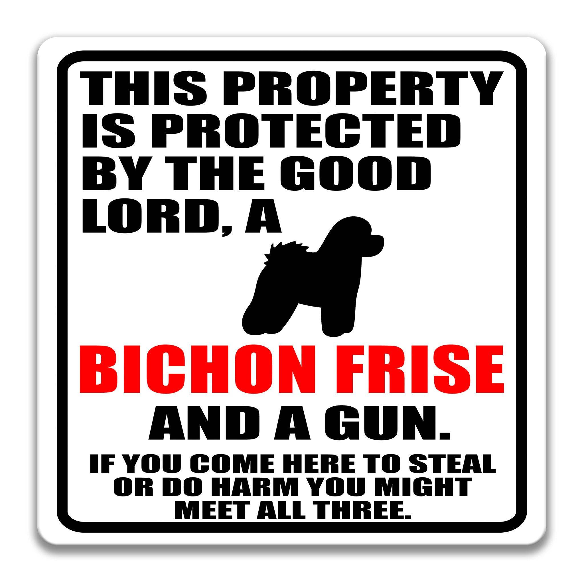 Property Protected by the Good Lord, a Bichon Frise, and a Gun Dog Sign