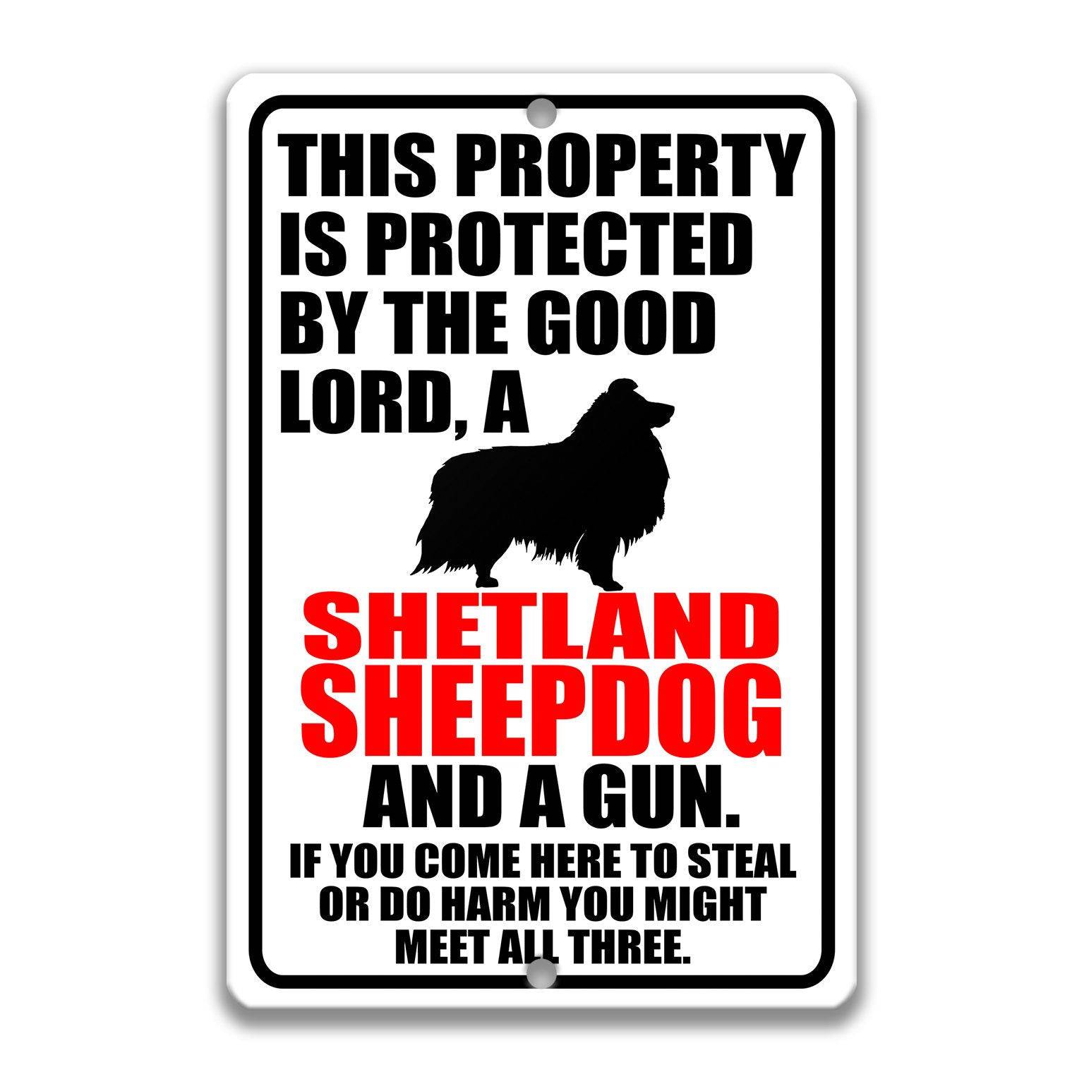 Property Protected by the Good Lord, a Shetland Sheepdog, and a Gun Dog Sign