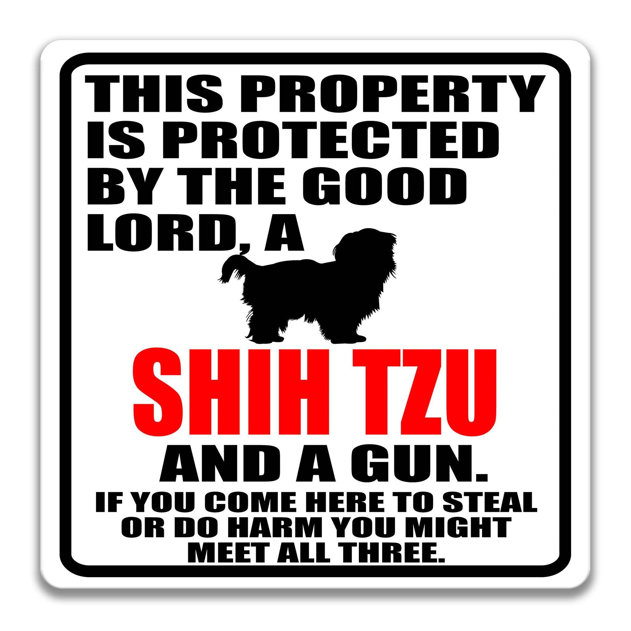 Property Protected by the Good Lord, a Shih Tzu, and a Gun Dog Sign