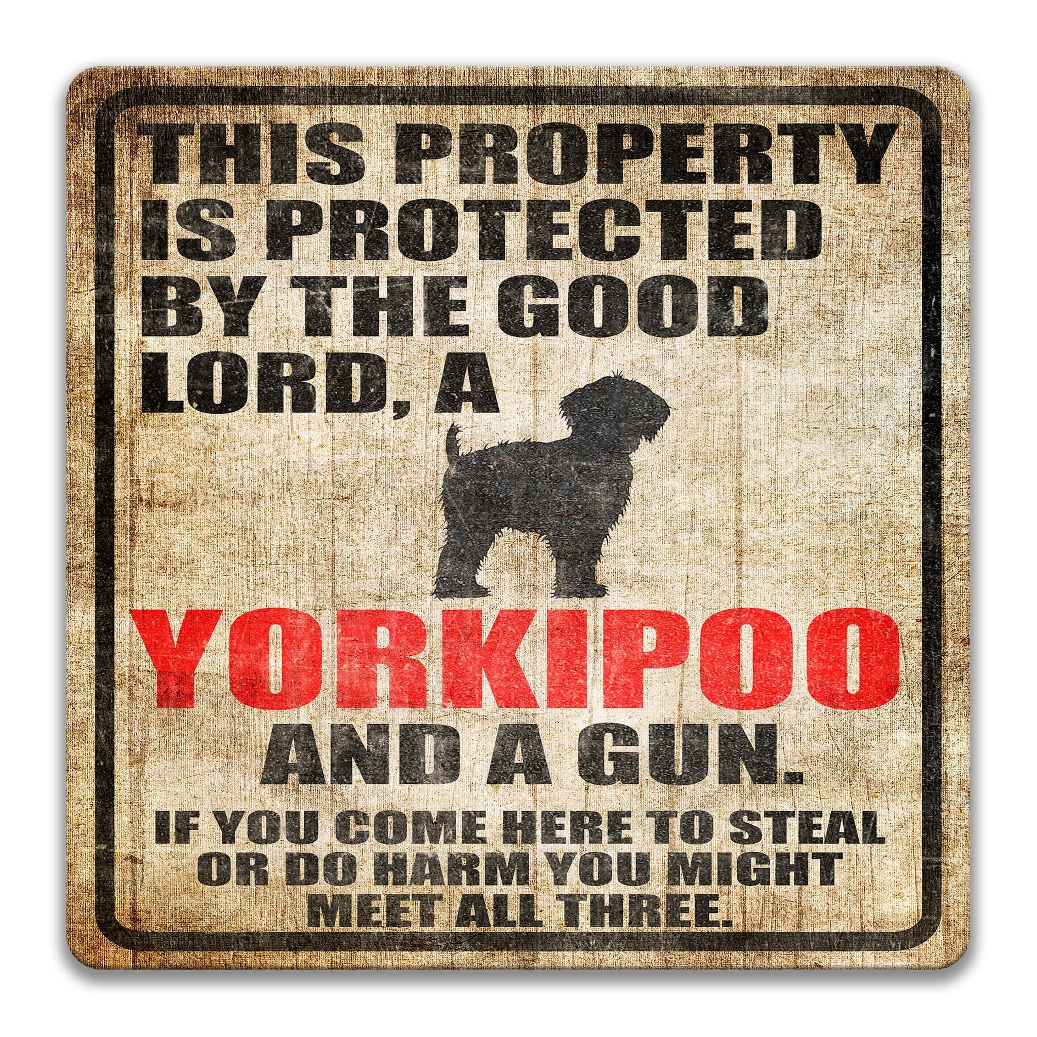 Property Protected by the Good Lord, a Yorkipoo, and a Gun Dog Sign