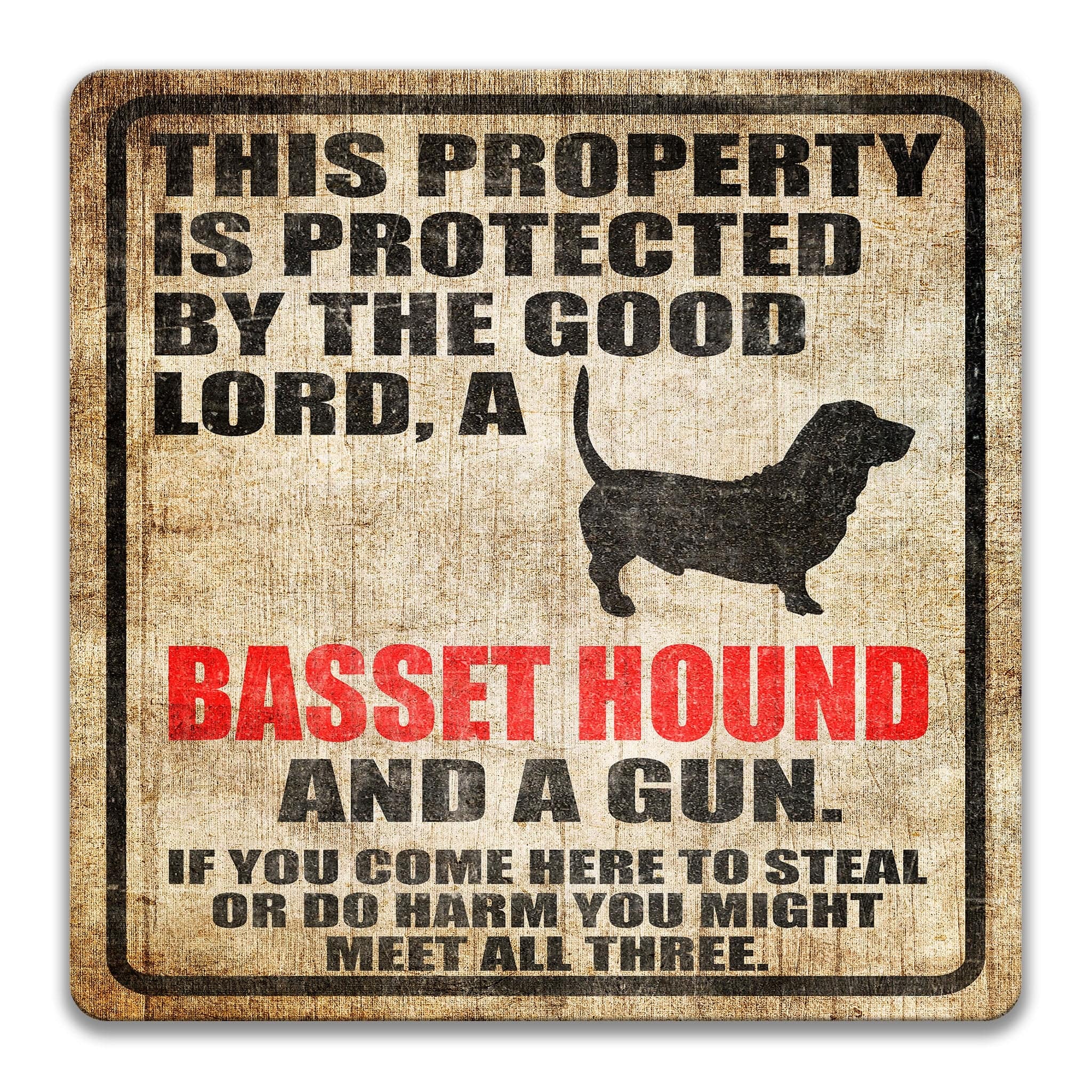 Property Protected by the Good Lord, an Basset Hound, and a Gun Dog Sign